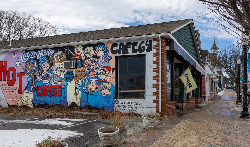 Exterior of Café 64 with painting mural