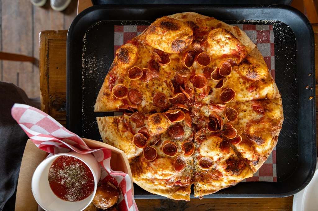 Double pepperoni pizza with crispy curled edges
