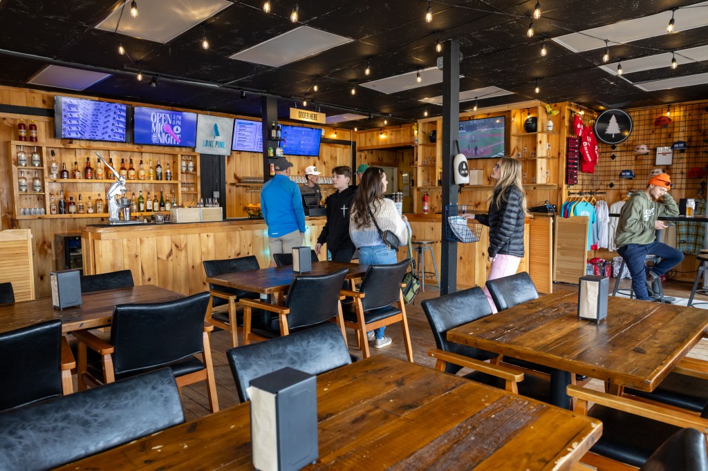 Interior of Lone Pine with wood finishes and seating area