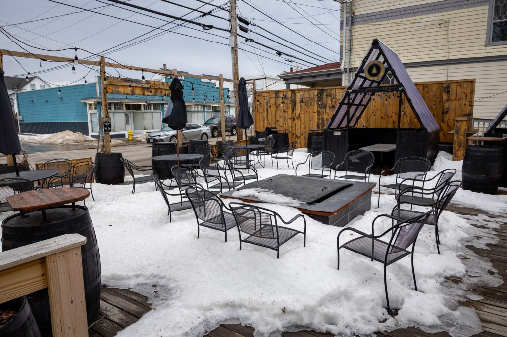 Snow-covered outdoor seating area at Lone Pine