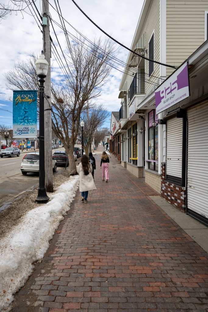 Brick sidewalk in Old Orchard Beach with shops