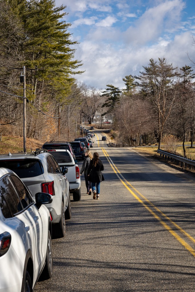 Cars lined along the road near Merrifield Farm during Maine Maple Sunday in Gorham Maine
