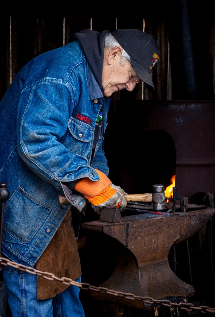 Blacksmith demonstration at Merrifield Farm during Maine Maple Sunday