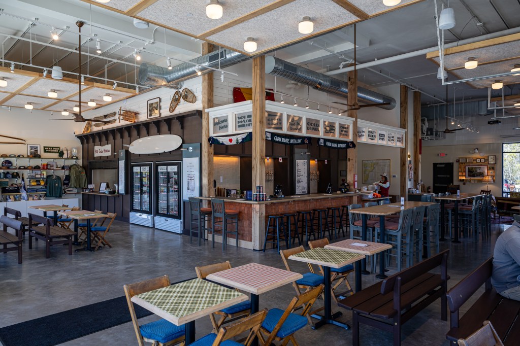 Open taproom layout showing tables and seating options
